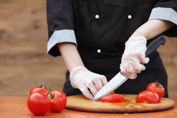 istock The cook cuts fresh farm vegetables 915066664