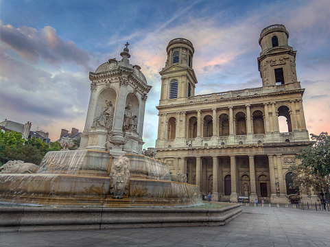 The Church of Saint-Sulpice and Fountain  in Paris, France.Late Afternoon in Summer.