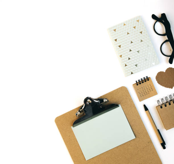 istock Flat lay, top view brown eco style office table desk. feminine working supplies 915067366
