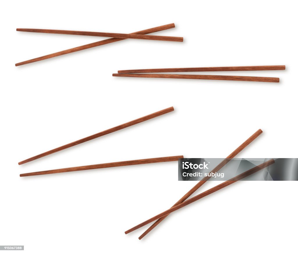 Chopsticks Variation Collection of four wooden chopsticks isolated on white (excluding the shadow) Bamboo - Plant Stock Photo