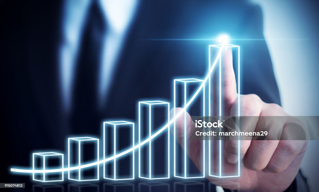 Business development to success and growing annual revenue growth concept, Businessman pointing arrow graph corporate future growth plan Charity Benefit Stock Photo