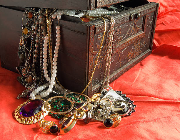 istock Wooden treasure chest with valuables in red 91507642