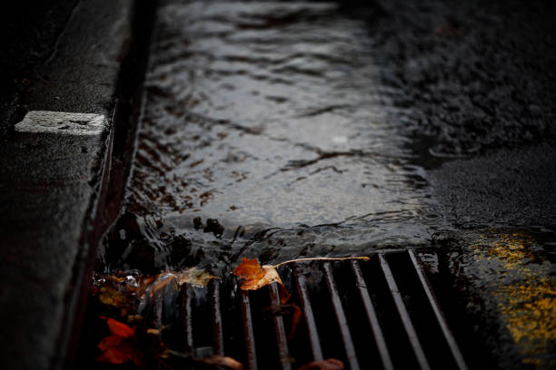 istock City Rain Weather Gutter Drain Leaves Autumn Fall Water 915078336