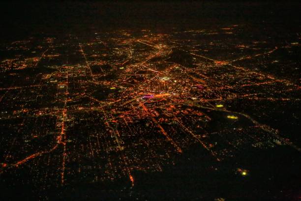 istock Aerial Glowing Light Grid Of City, Black Sky, Copy Space 915078342