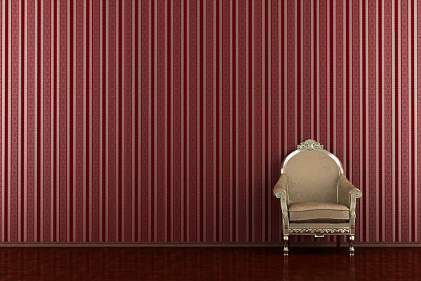 istock classic armchair in front of red striped wall 91508036