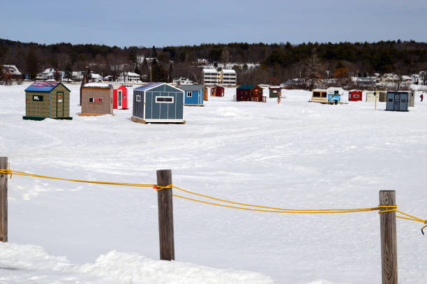 istock Winter Ice Fishing Shacks 915081524