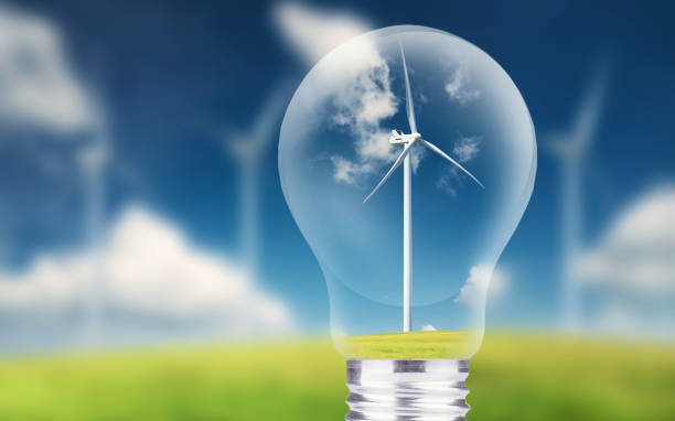 central eólica en la lámpara. concepto de energía ecológica - wind turbine motion alternative energy wind power fotografías e imágenes de stock