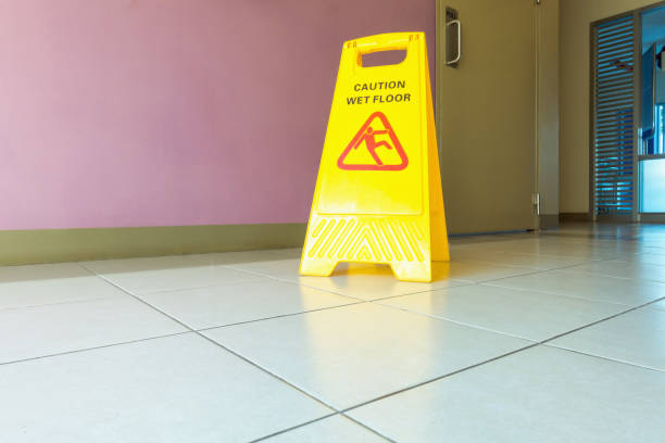 istock Caution wet flooring signboard on the corridor 915090590