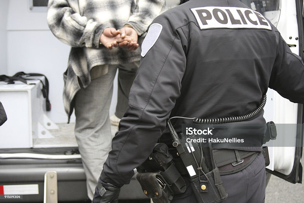 Arrested - 로열티 프리 경찰관 스톡 사진