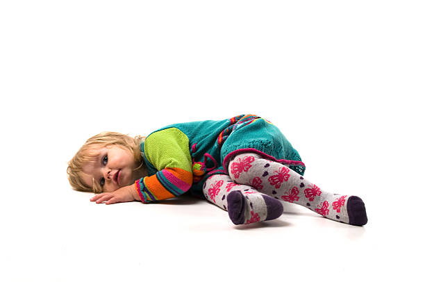 istock Baby lies on the floor 91509532