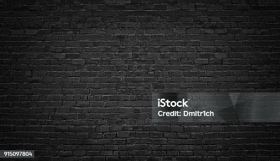 istock black brick wall background. texture dark masonry 915097804