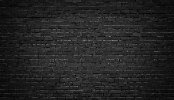 dark brick wall as a backdrop. brickwork design element