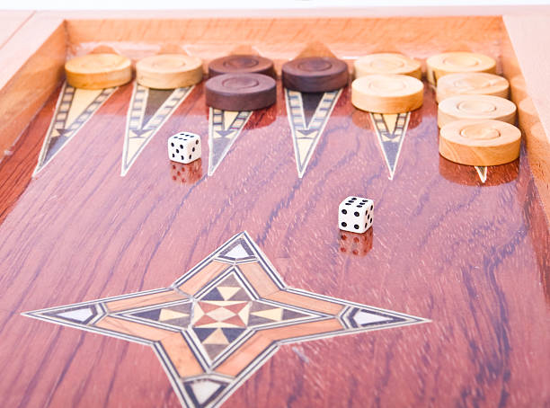 istock White dices on wooden handmade backgammon board isolated 91509923