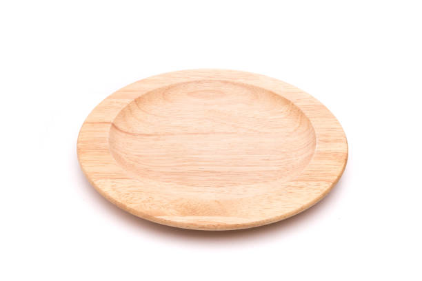 istock New empty wooden bowl. Studio shot isolated on white background 915100810