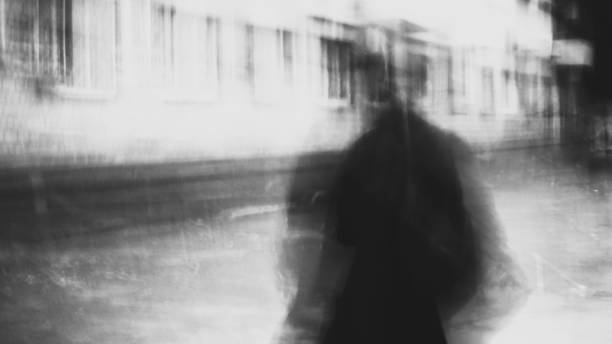 istock shady person walking 915101166