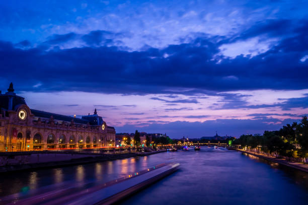 istock Seine and Orsay Museum at night 915105756