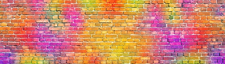 colorful brick wall background. painted in different colors brickwork