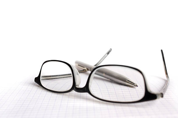 istock Glasses and pen on paper 91510980