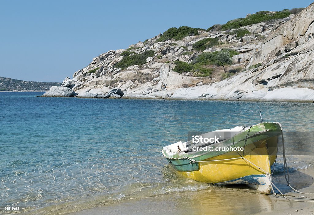 Old boat on the beach - Greek Mediterranean old boat with yellow and green color on the beach in the Greek Mediterranean

Please see some similar pictures from my portfolio:
[url=file_closeup.php?id=8764963&refnum=cruphoto][img]file_thumbview_approve.php?size=2&id=8764963[/img][/url] Bay of Water Stock Photo