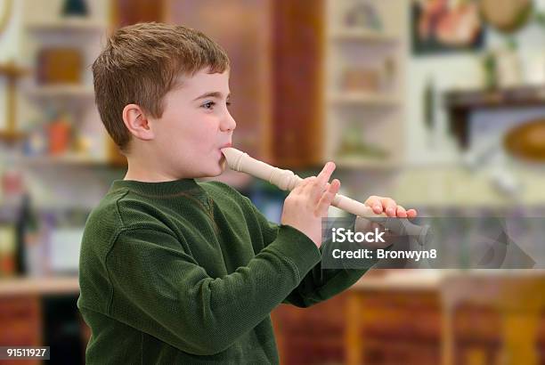 Playing An Instrument Stock Photo - Download Image Now - Recorder - Musical Instrument, Child, Flute - Musical Instrument