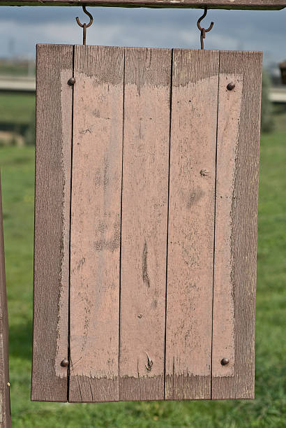 weathered wood sign stock photo