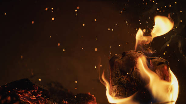 istock close up wood burning in the fireplace 915128400