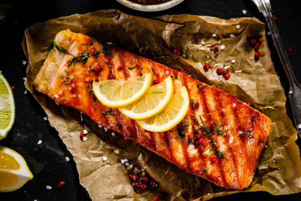 istock Fish dish - salmon steak and vegetables 915131432