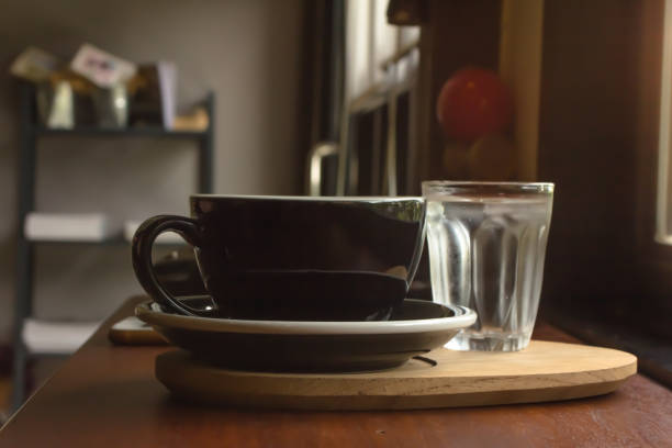 istock Cup of Coffee on Brown Table 915131668