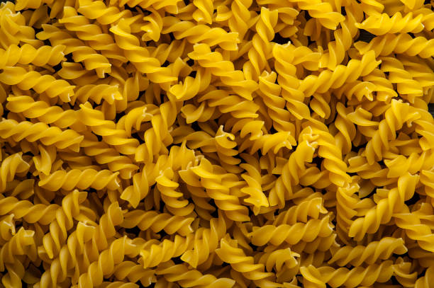istock Fusilli pasta background. Italian cuisine. 915137046