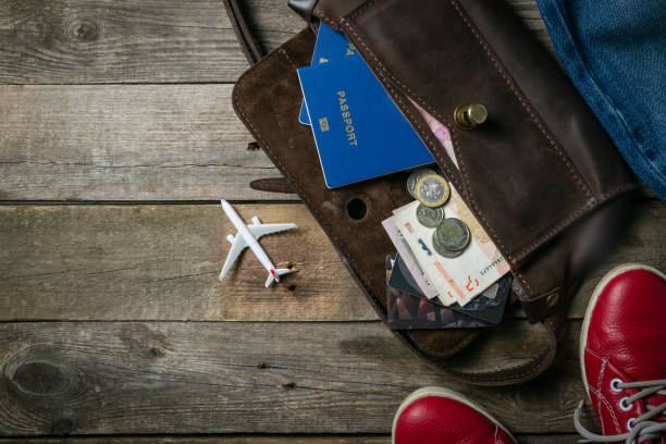 istock Traveling concept - essencials, camera, phone, plane 915137200