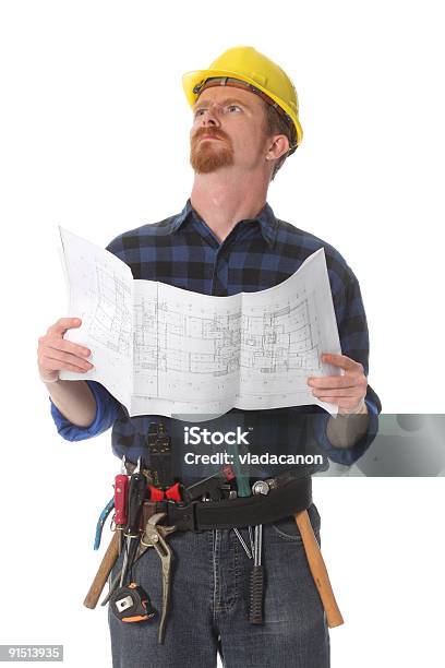 Construction Worker And Architectural Plans Stock Photo - Download Image Now - Adult, Architect, Architecture