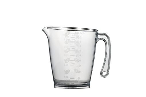 Empty kitchen measuring cup isolated on white with clipping path