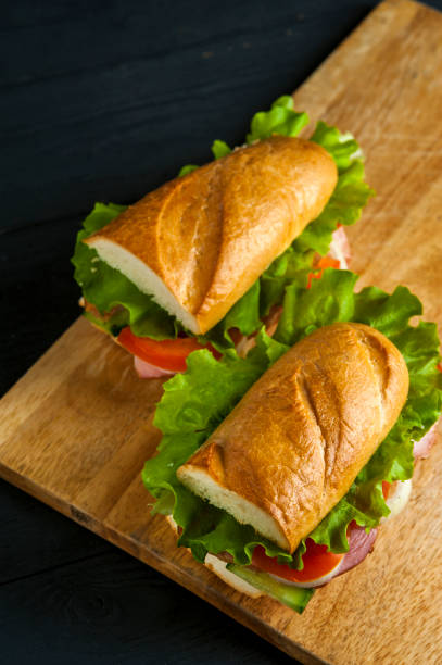 istock Tasty sandwiches with ham and vegetables 915140604