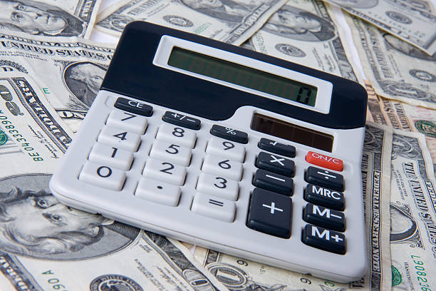 istock american money with calculator 91514212