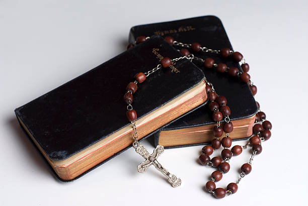 Hymn Books with Rosary stock photo