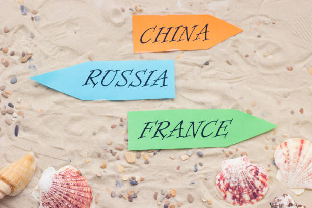 istock Vacation accessories on sand background 915148000
