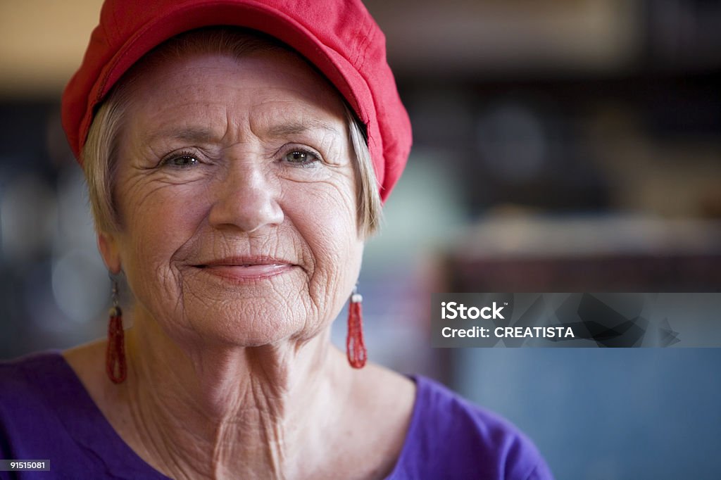 Senior Woman Wearing Red Hat  Hat Stock Photo