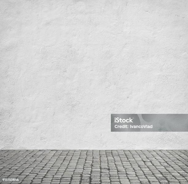 White Wall Of The House Stock Photo - Download Image Now - Flooring, Cobblestone, Street