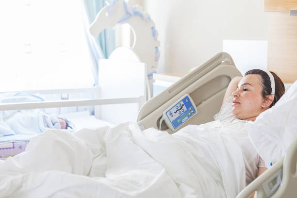 istock New born baby with his mother 915151122