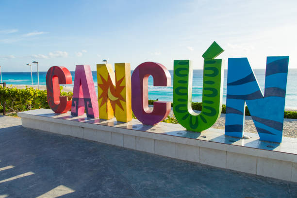 Colorful Cancun sign, Hotel zone, Playa Delfines, Cancun, Mexico Cancun - one of the most expensive resorts in the world cancun stock pictures, royalty-free photos & images