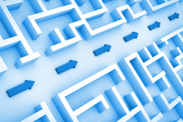 istock blue maze structure, arrows showing shortcut through labyrinth 915151838
