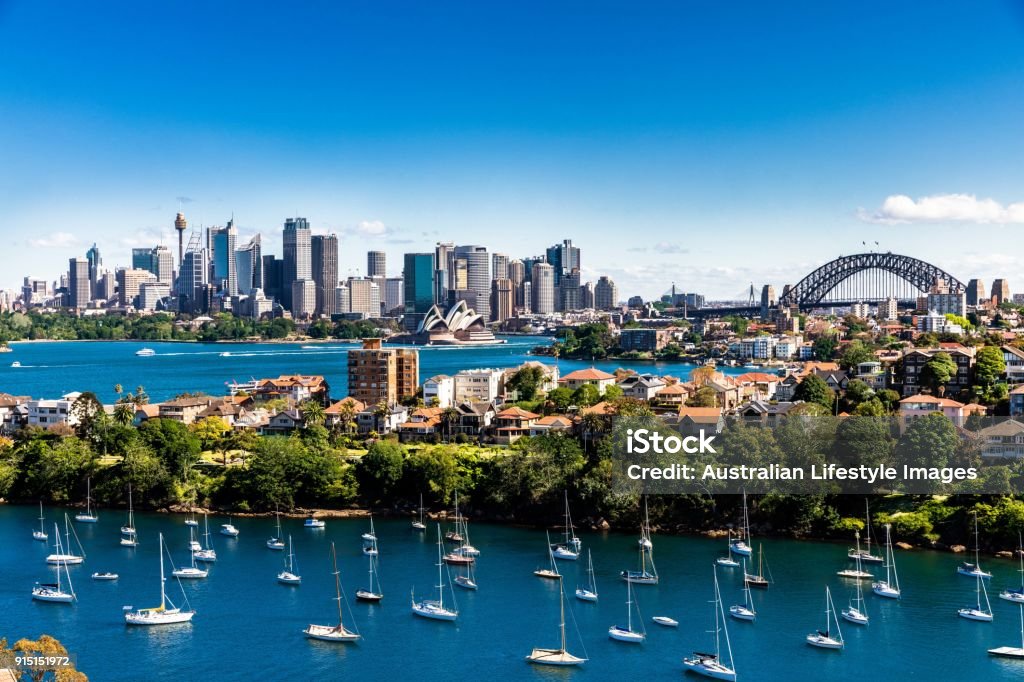 Panorama of Sydney City and Harbour on a bright clear day City of Sydney panorama showing the Harbour Bridge and Opera House Sydney Stock Photo