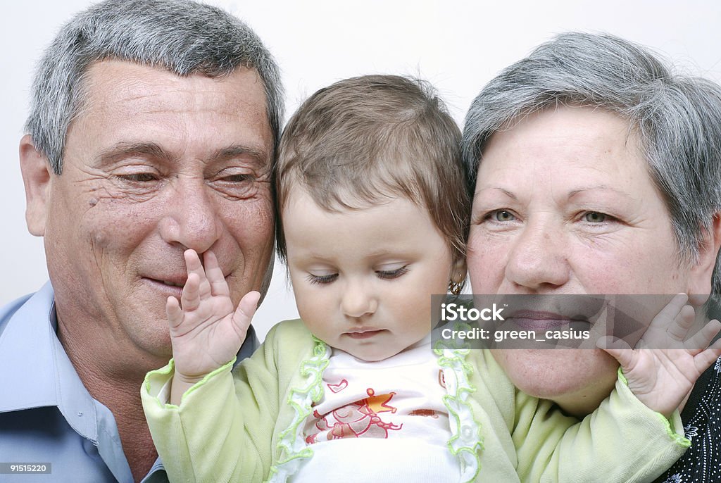 Abuelos y nietos - Foto de stock de Abrazar libre de derechos