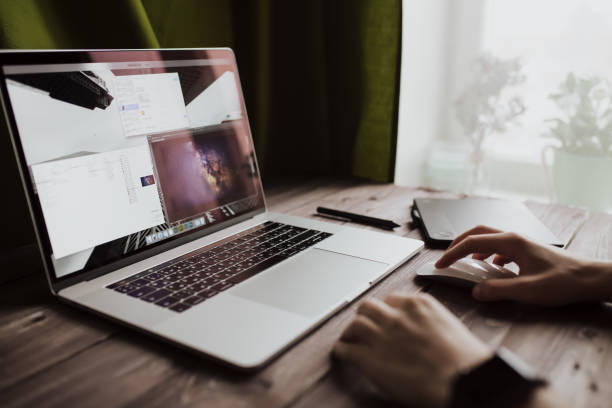 istock Man freelancer is working using laptop computer at home office. Freelance lifestyle workplace 915160740