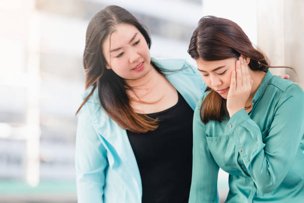 istock woman comforting 915160972