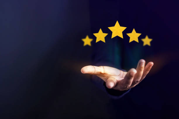 istock Customer Experience Concept, Best Excellent Services for Satisfaction present by Opened Hand of Client giving a Five Star Rating 915162404
