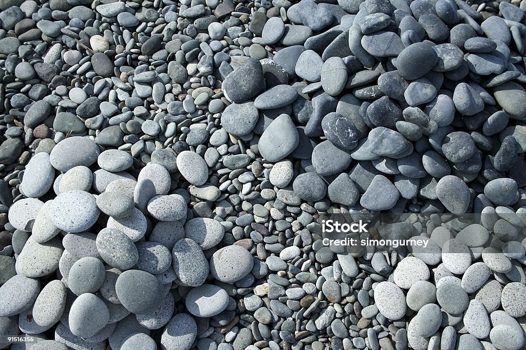 Pedras lisas pebble beach - Foto de stock de Abstrato royalty-free