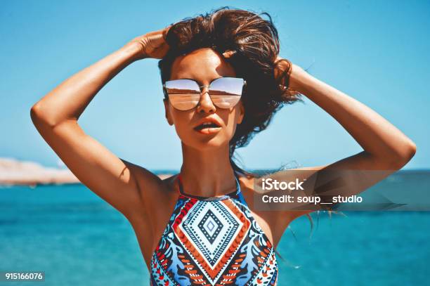 Happy Woman At Sea Stock Photo - Download Image Now - Women, Sunglasses, One Woman Only