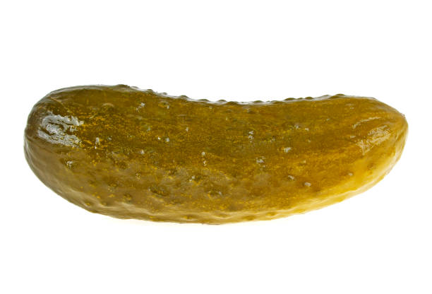 istock Marinated pickled cucumber isolated on white background 915173566