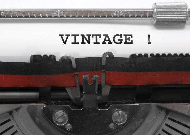 Text VINTAGE written with the old typewriter on white sheet